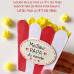 Groupe d'enfants créant des cartes de fête des pères en papier