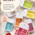 Désinfectants pour les mains colorés et parfumés sur une table