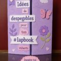 Un lapbook illustrant l'utilisation de dépliants colorés et créatifs.