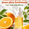 Bouteille de sérum à la vitamine C stabilisée sur une table en bois, près de plantes.